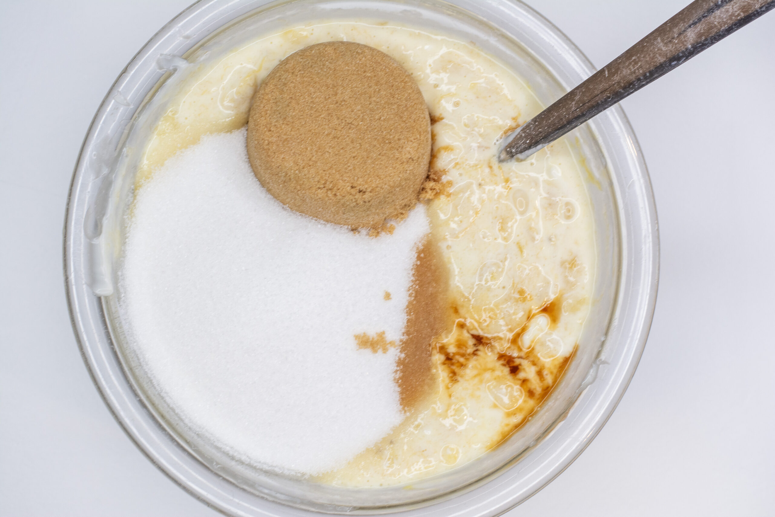 Sugar added to the mayo, egg, and banana mixture.