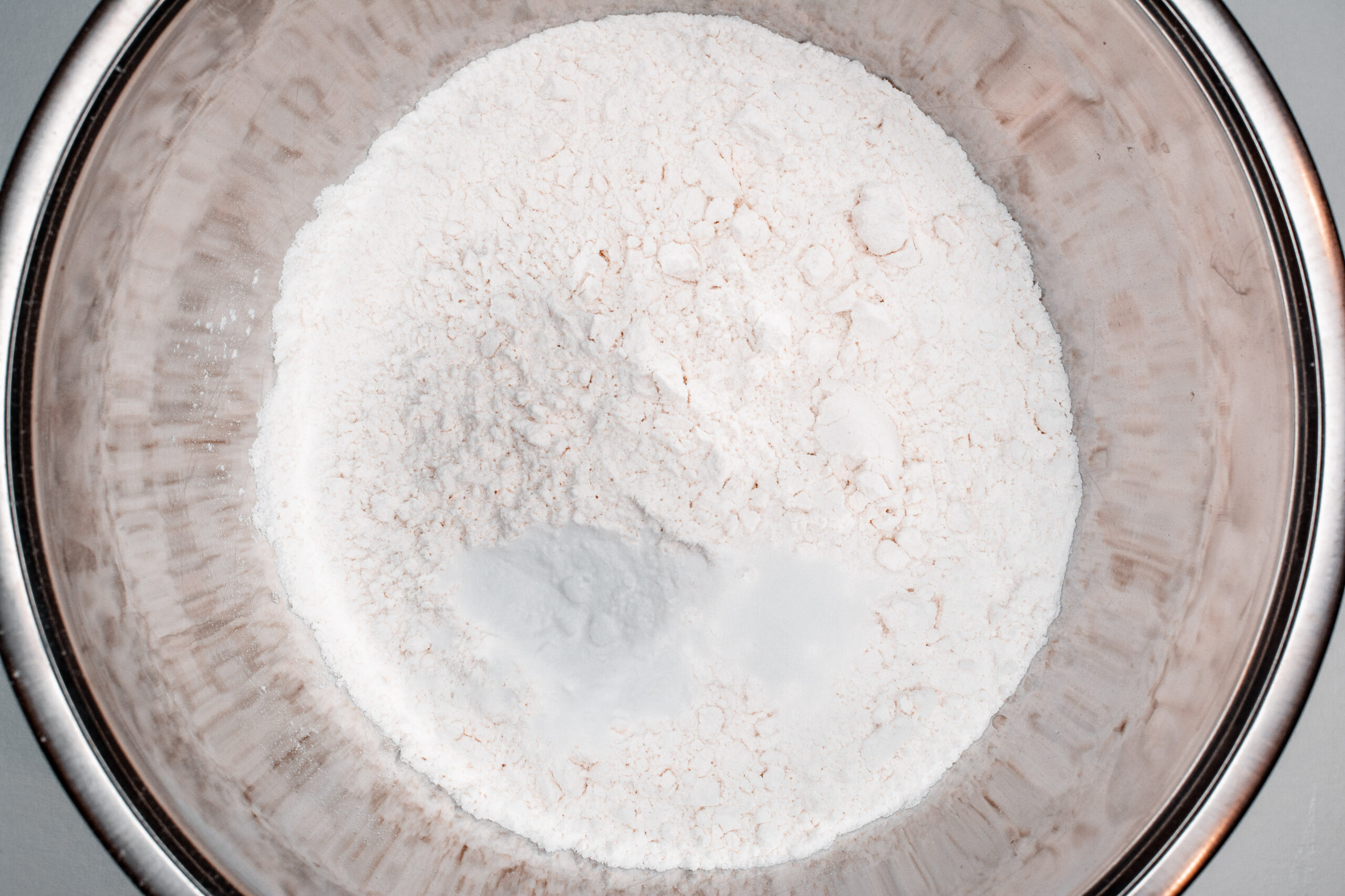 Dry ingredients for the Banana Bread are in a bowl.