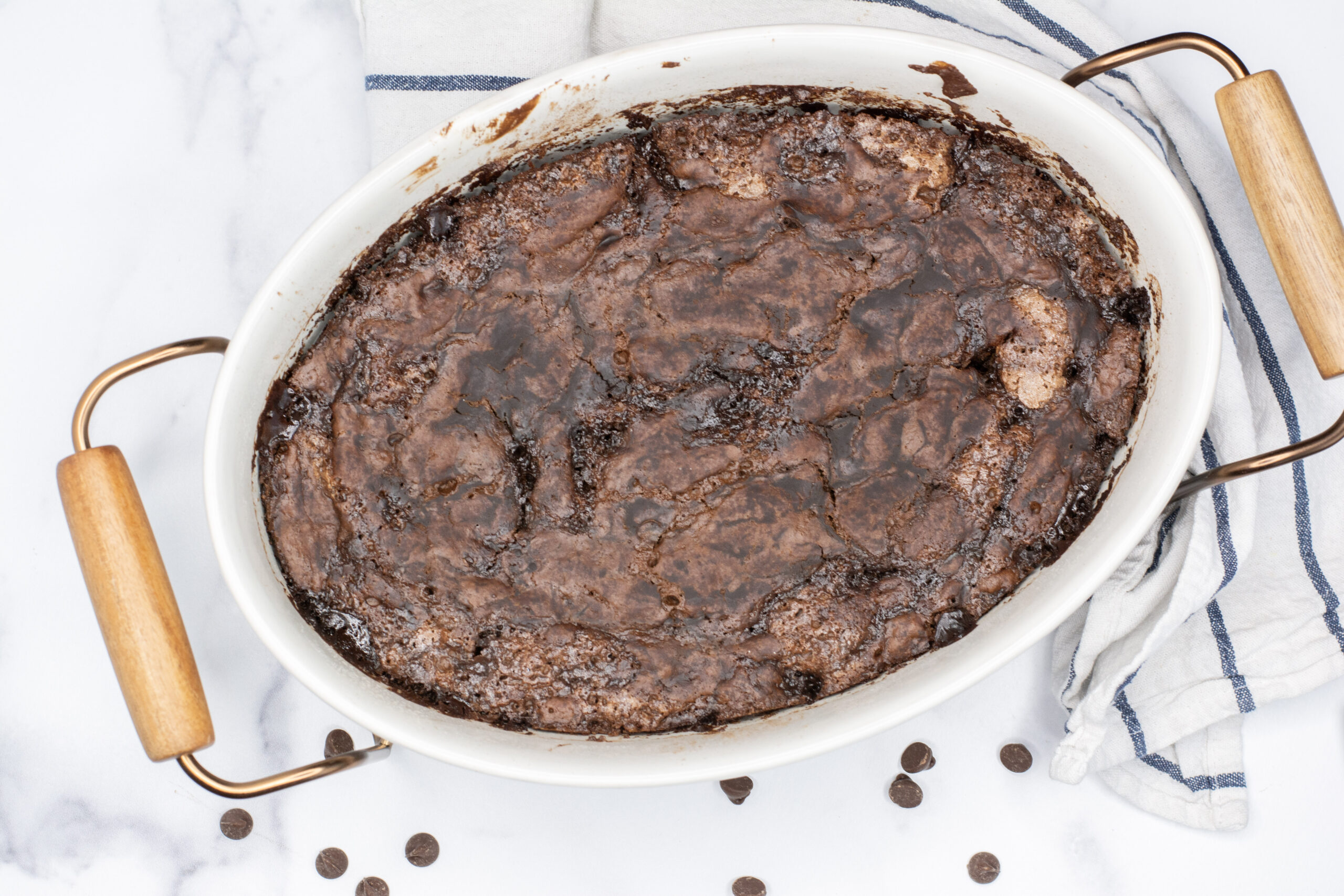 Pudding cake removed from oven with hot fudge.