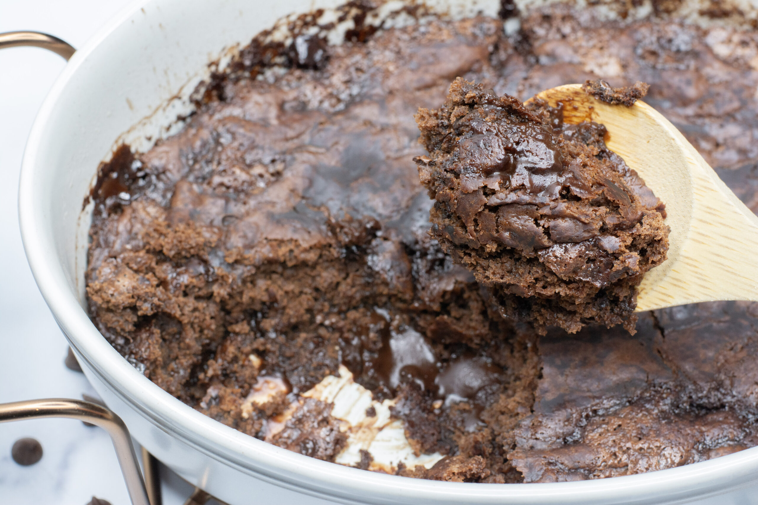 Scoop of Hot Fudge Pudding Cake out of the pan.