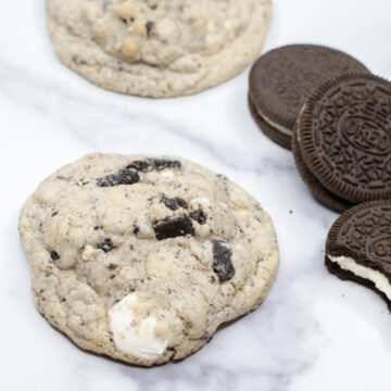 Cookies & Cream Cookie with Oreo Cookies in the background.