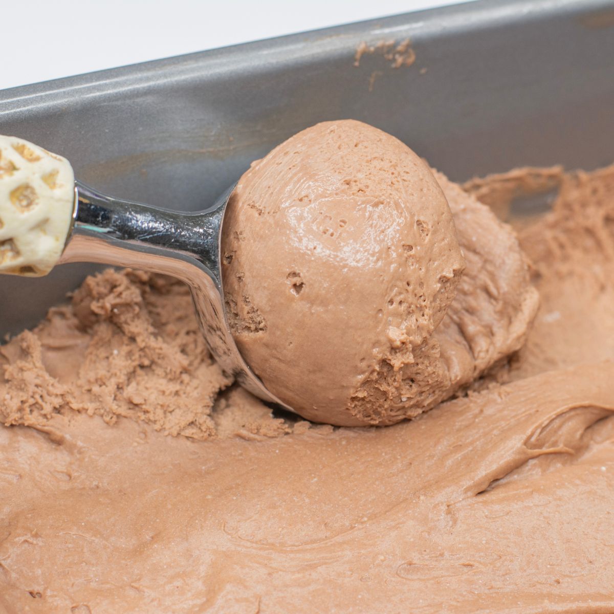 Chocolate Cake Batter Ice Cream (No-Churn) in an ice cream scoop
