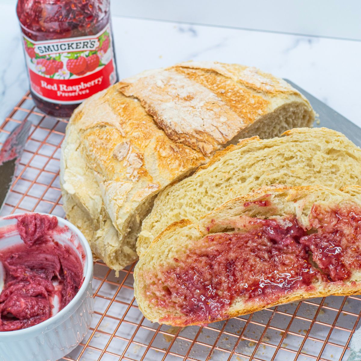 Dutch Oven Bread with jam on it.