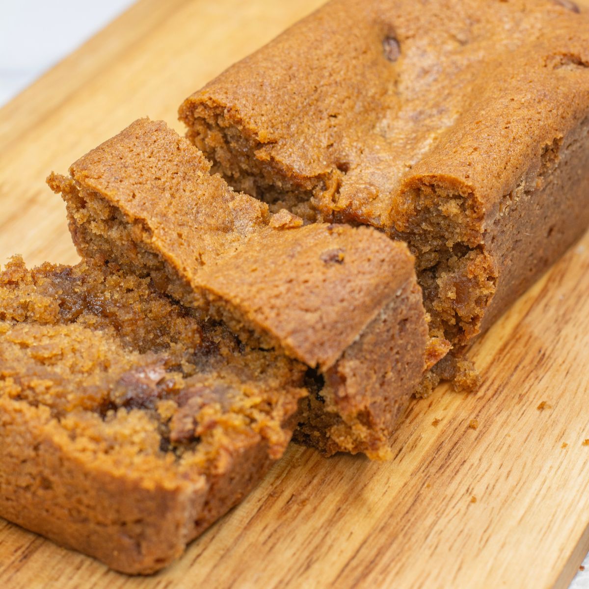 close up image of sliced pumpkin bread for one