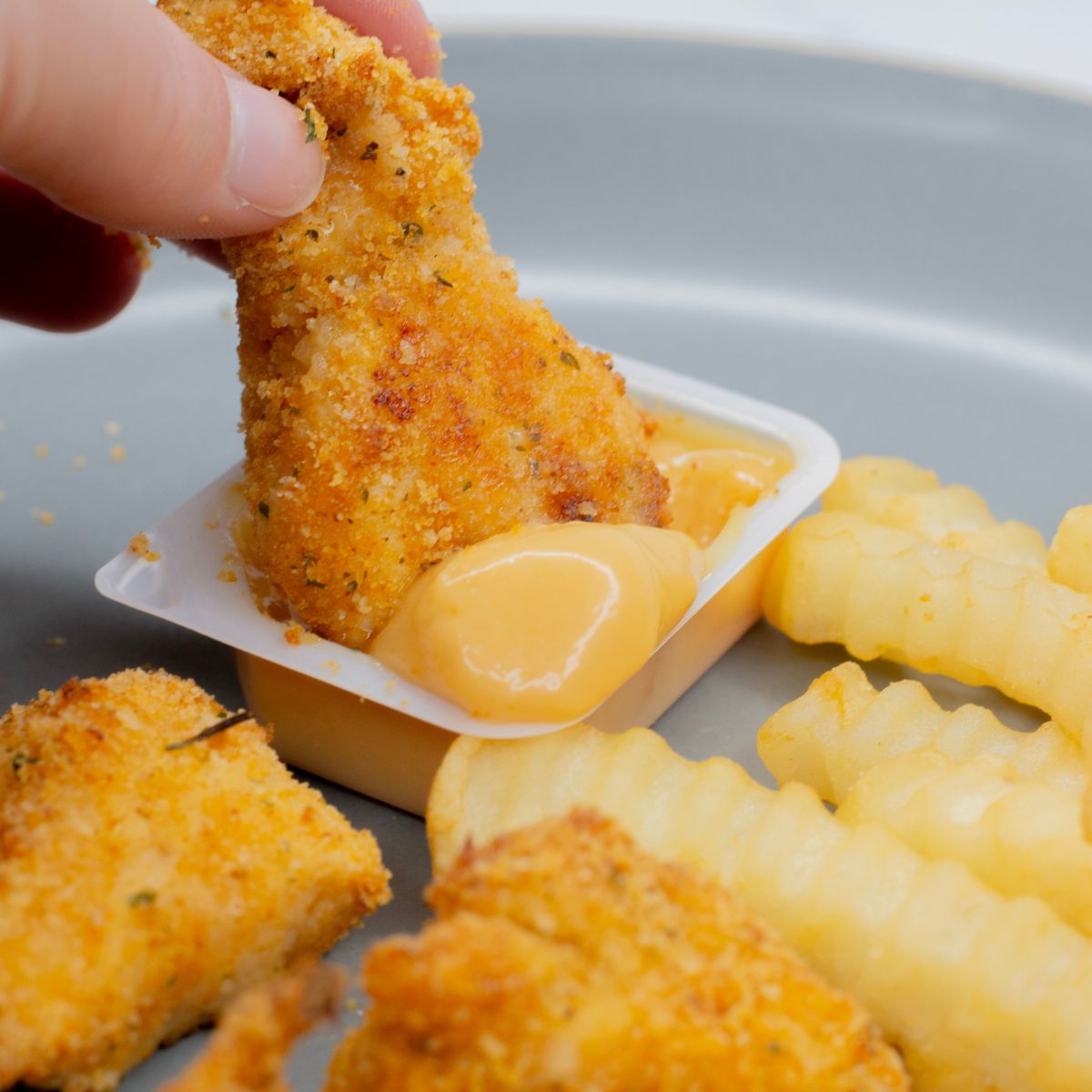Chick-fil-A nuggets dipped in chick-fil-a sauce. Copycat recipe at home.