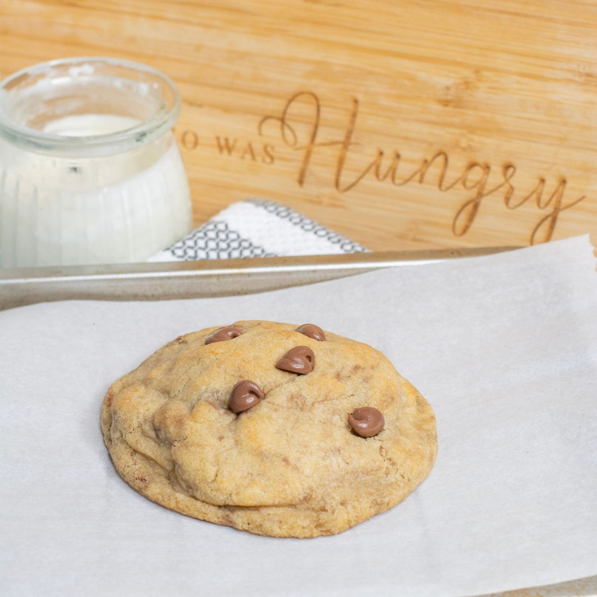 Chocolate chip cookie for one on a baking sheet