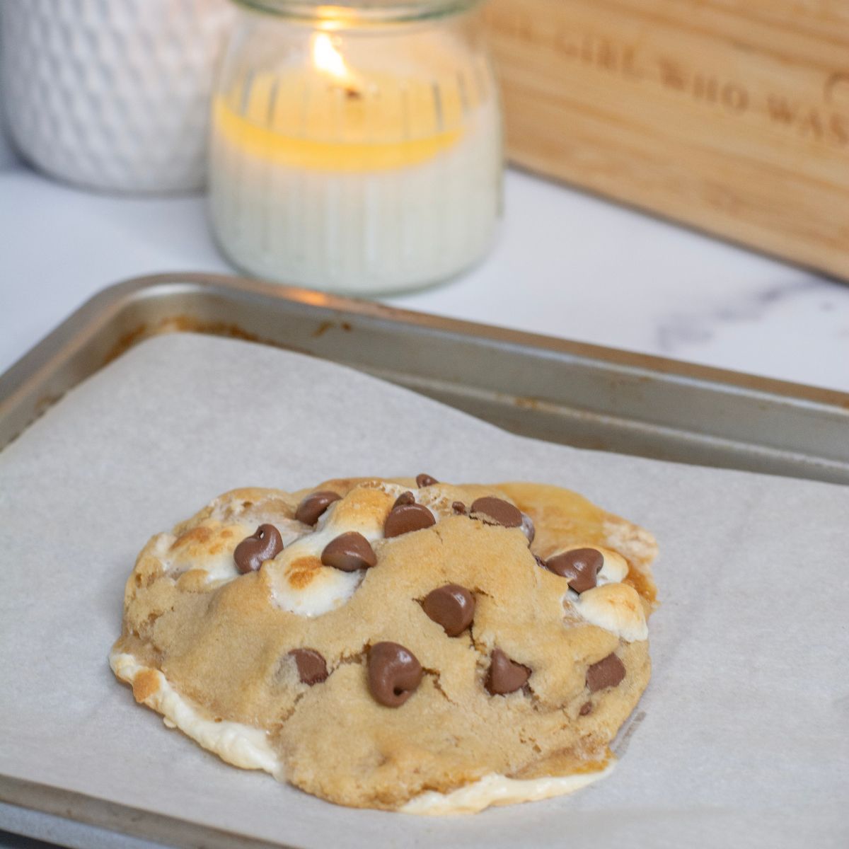 large cookie on a baking sheet