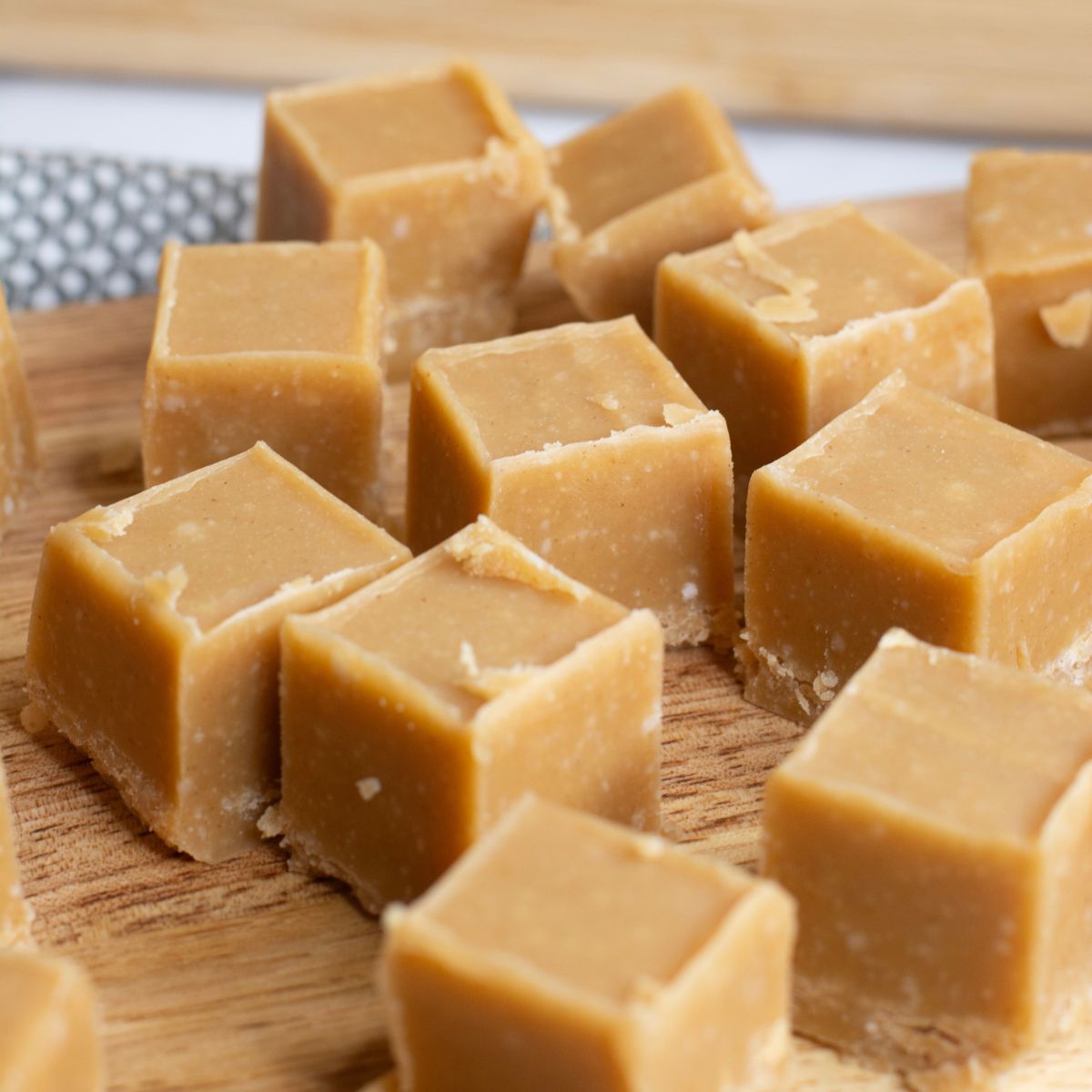 close up image of easy peanut butter fudge recipe in cubes