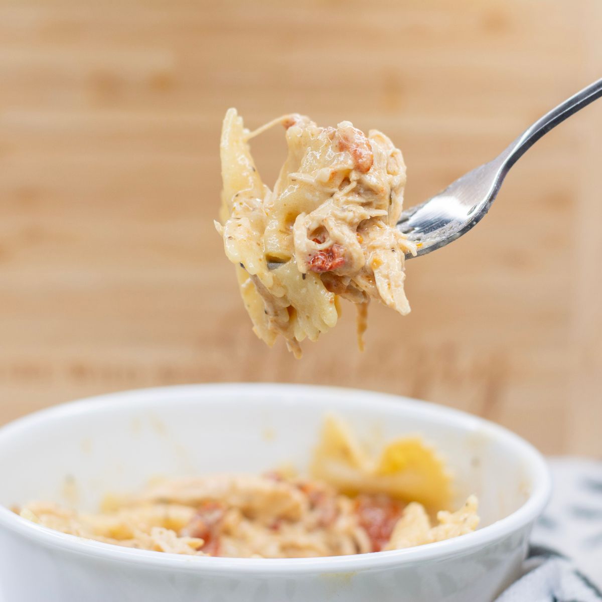 Crock Pot Marry Me Chicken Pasta in a bowl 