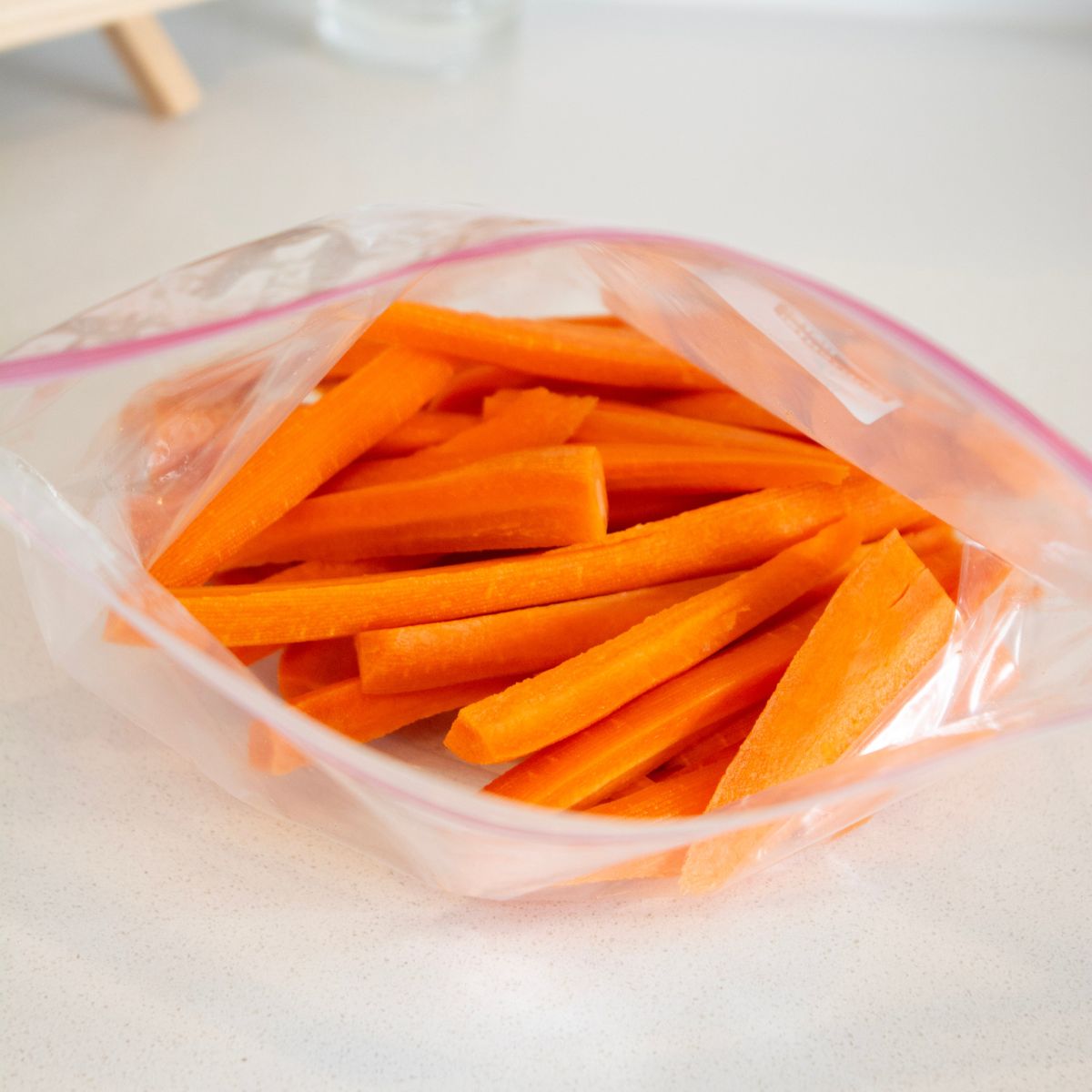 peeled and cut carrots in a gallon size zip-top bag. 