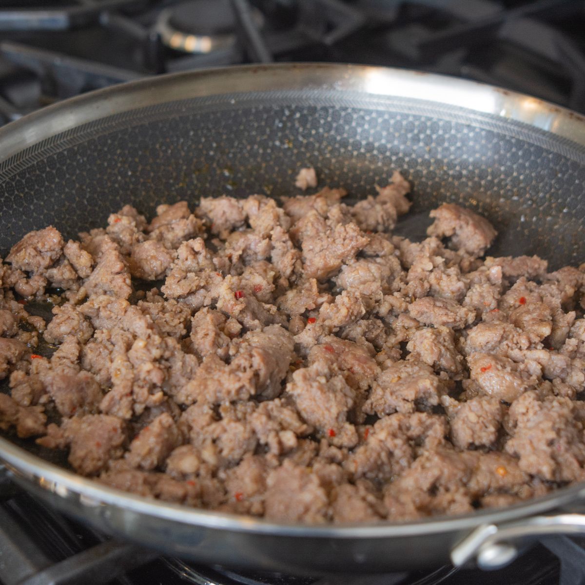 ground sausage in a frying pan